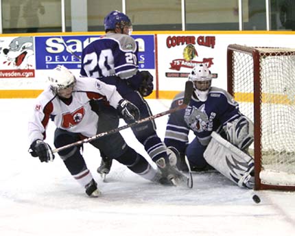 The Kal Tire Jr Wolves and North Bay Trappers have waged some classic battles this year, including a pair of overtime games just four days apart (<i>photo provided courtesy of www.actioneventphotos.com</i>)